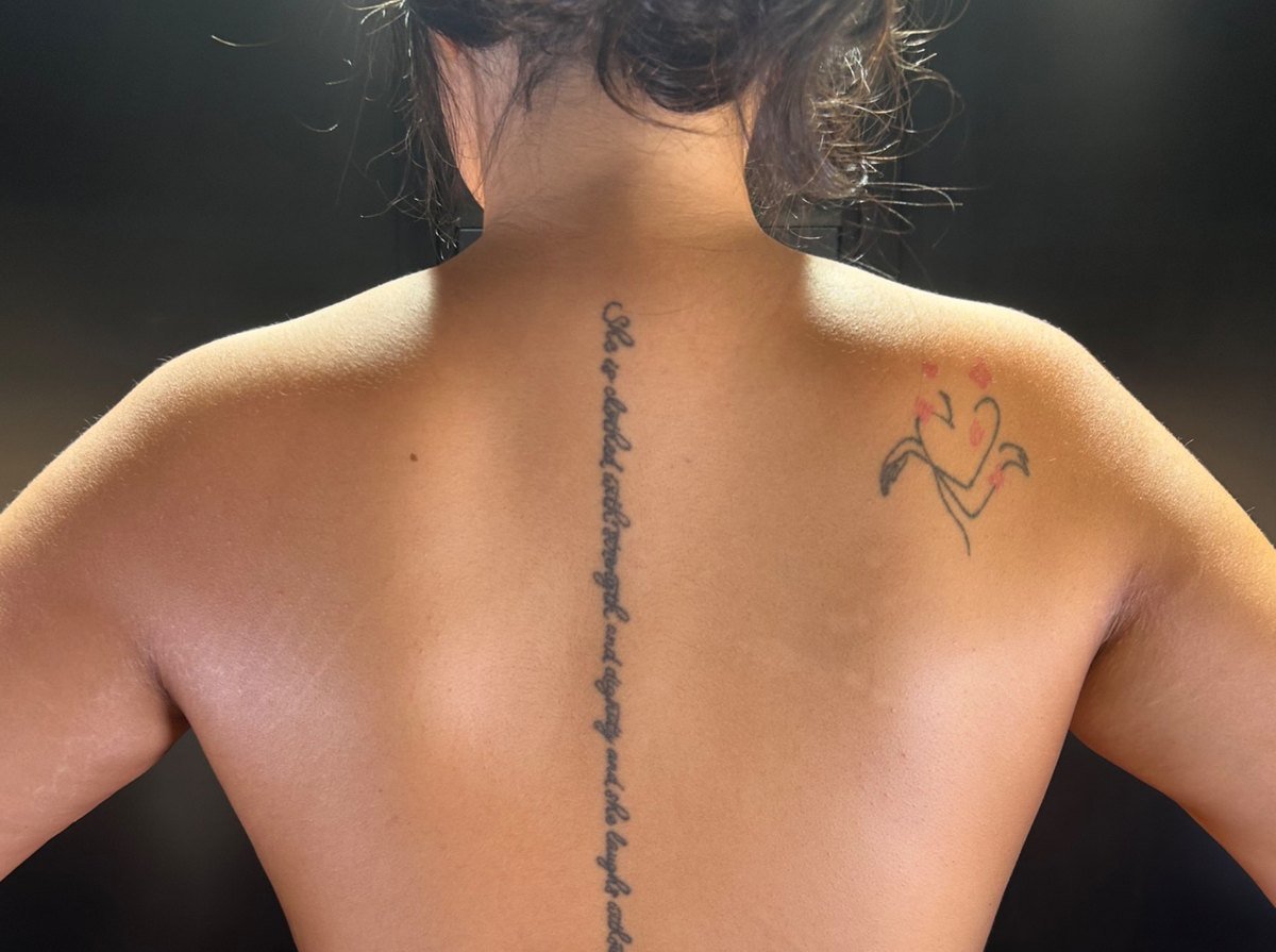 Even custom spray tan across shoulders and back